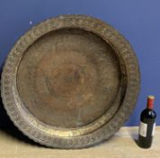 Large Copper tray, set within a deep scalloped edge rim, 72cm diam