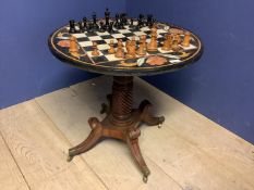 Good Italian marble circular inlaid games table supporting on a Regency inlaid mahogany quadruped