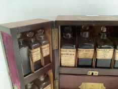 C19th mahogany travelling apothecary case with counter sunk top handle with original fitted labelled