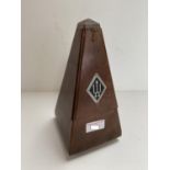 A German metronome with adjustable dial. Condition generally good