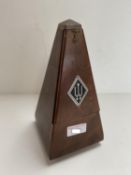 A German metronome with adjustable dial. Condition generally good
