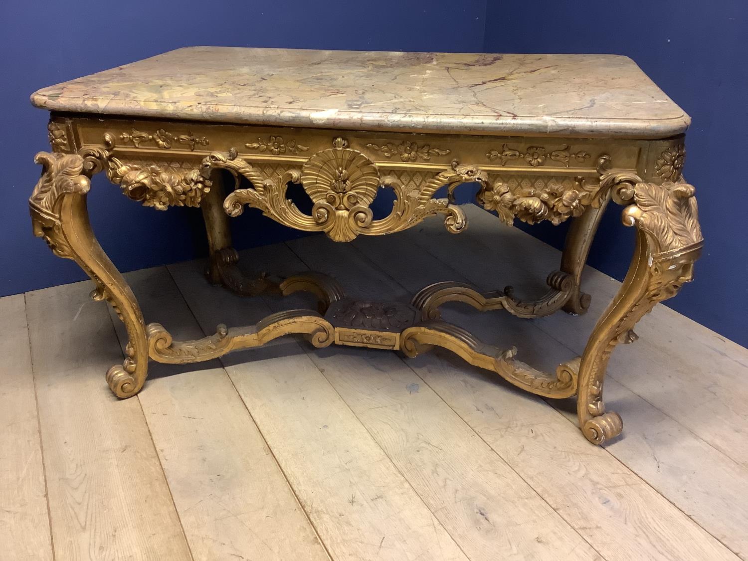 Early C18th/C19th giltwood side table in the manor of William Kent, elaborately carved & gilded unde