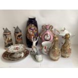 Mixed lot of Continental porcelain, and two Steins, one musical (all general wear)