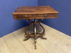 George IV mahogany salon table of 2 drawers supported on open scrolling and metal base with ormolu