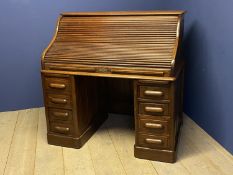 Good Victorian honey coloured oak roll top desk with fitted interior 128cm L x 126cm x H x 81cm D.