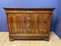 C19th French fruitwood commode of 3 long graduated drawers beneath a shaped drawer & black marble