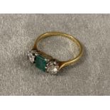 Emerald and diamond 3 stone ring, unmarked, probably 18 ct Size O