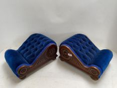 Pair of velvet upholstered and button backed and carved wood kneelers on bun feet