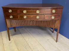 Good Sheraton inlaid mahogany fitted bow front dressing table beneath a hinged lid 85h x 122w x 61.