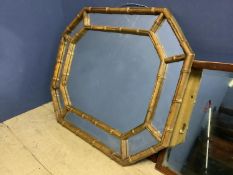 Bamboo style cushion framed wall mirror 65 x 80 overall. Condition generally good