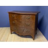 Regency gentleman's large figured mahogany serpentine front commode of 3 long graduated drawers with