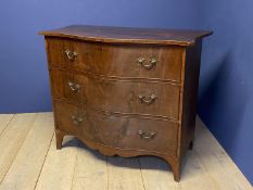 Regency gentleman's large figured mahogany serpentine front commode of 3 long graduated drawers with
