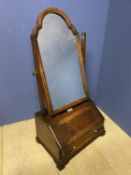 George III crossbanded walnut toilet mirror with arched top supported on a fitted bureau base on