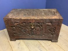 Mid C20th heavily carved camphorwood chest with hinged lid. 97cm L x 55cm H x 48cm D. Condition: