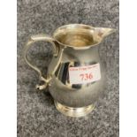 Silver pear shape cream jug with sparrow beak spout & scroll handle by Walter H Wilson London