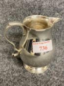 Silver pear shape cream jug with sparrow beak spout & scroll handle by Walter H Wilson London