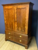 Good early C19th line inlaid cherry wood small linen press with shaped fielded panelled door above 2