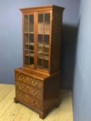 George III mahogany 2 piece part glazed bookcase of small proportions, the base of a brushing