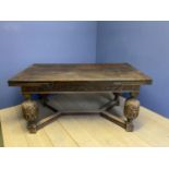 Late C19th heavy carved oak extending refectory table on baluster legs united by a central