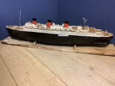 A scratch built and finely detailed tin model of "Queen Mary" on a stand approx 112 cm L