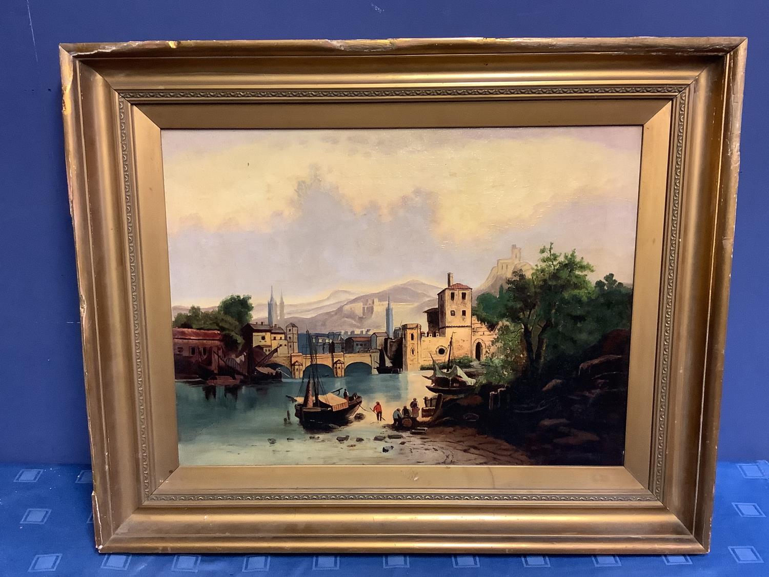 Continental oil on canvas, "town landscape, with boat and figure in foreground", gilt frame , 44.5 x