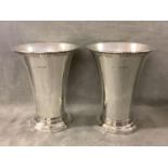 Pair silver beakers in C17th style, the flared bowls on a moulded foot by D & J Wellby, London 1932.