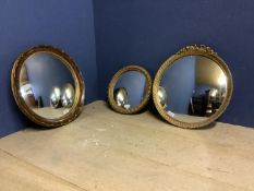 3 small circular gilt framed mirrors, 30cm, 42cm & 41cm diam