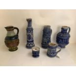 5 pieces of German salt glazed stoneware, including tankard, and jugs Condition Report: various