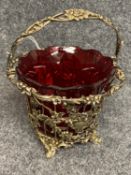 Early Victorian silver gilt sugar or sweetmeat basket, the wirework sides applied swags of