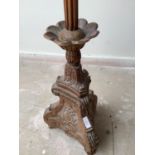 Good C19th carved pine column stand on a triform base 139 cm H converted to a lamp stand.