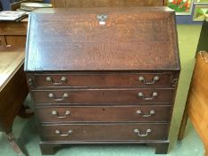 George III oak bureau with 4 long drawers with fitted interior, 108h x 100w x 50d cm.