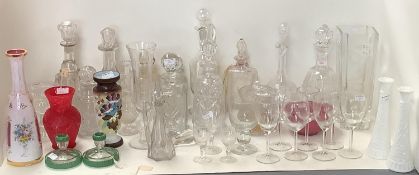 Collection table glass, including decanters, wine glasses, jugs and vases, and a Bohemian overlay