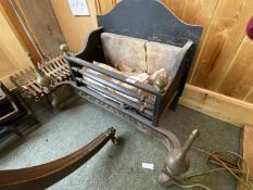 A Regency style brass and cast iron fireplace