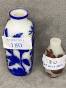 Chinese blue overlay white glass 'flowers' snuff bottle, together with a 'butterfly' snuff bottle,