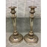 Pair of Georgian Hallmarked Silver (weighted) circular embossed candle sticks. 35cm H (1815),