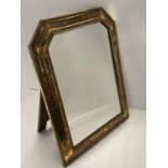 Hallmarked silver mirror set within an engraved frame, overall 45.5 long, x 36 cm wide, backed on