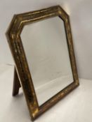 Hallmarked silver mirror set within an engraved frame, overall 45.5 long, x 36 cm wide, backed on