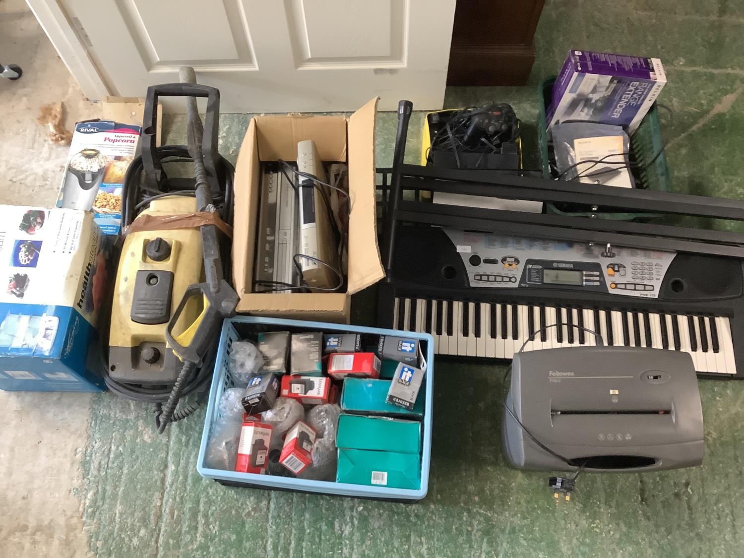 Keyboard, Playstation, pressure washer, shredder, DVD player, stacking steamer, popcorn maker (not