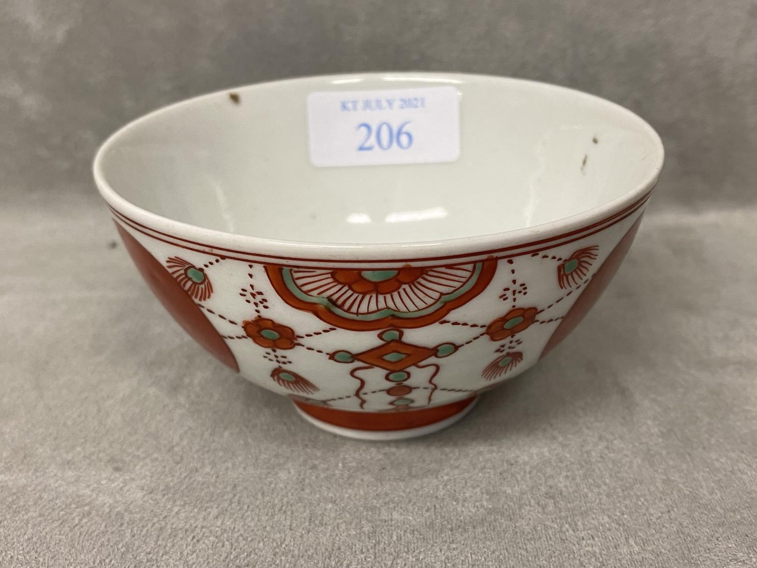 Oriental bowl painted with buddhist tassels and red ball pattern, blue mark to base.