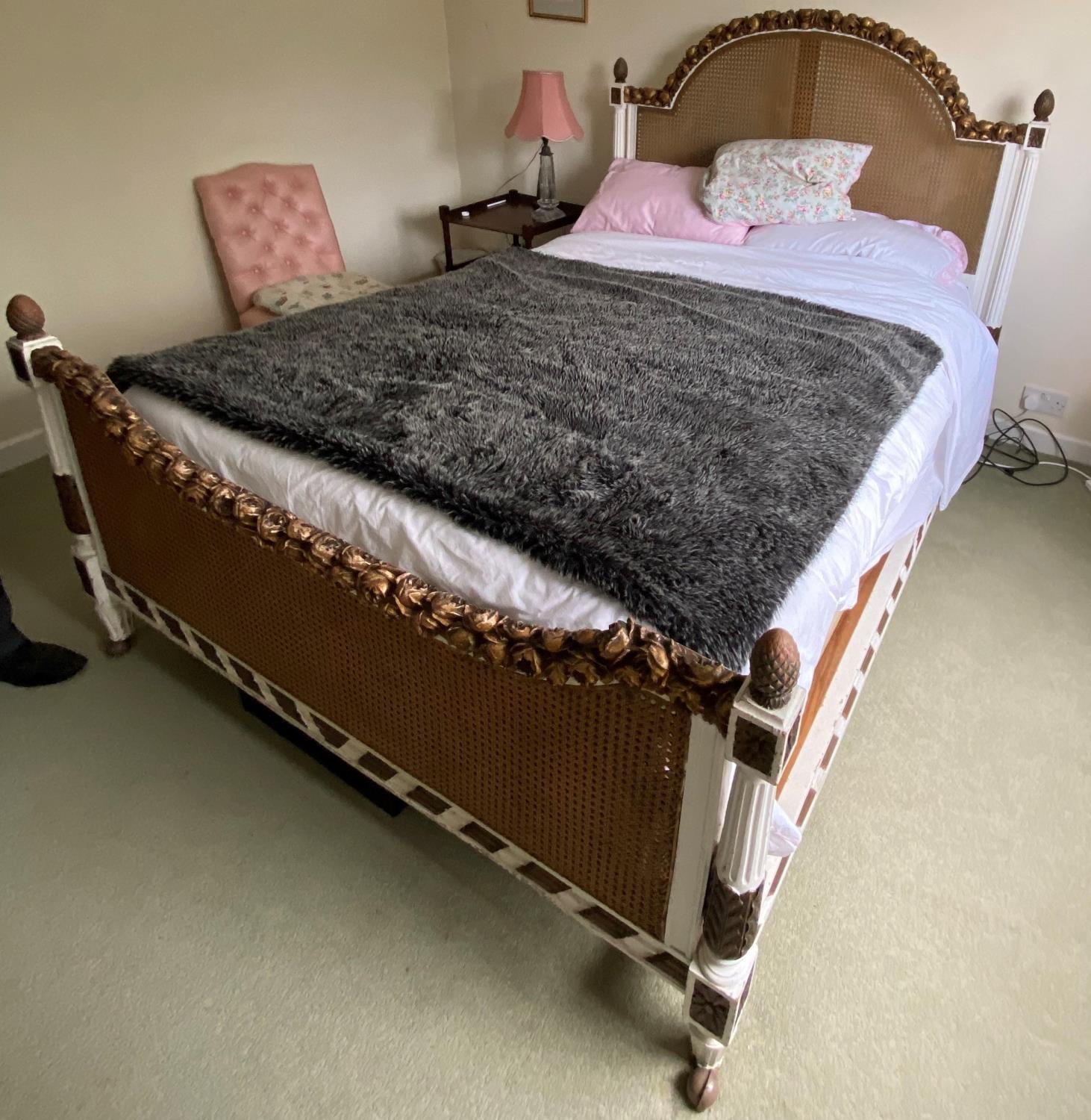 Decorative painted bed with double caned Bergère headboard and end with pineapple finials, approx