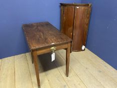 Pembroke table and a hanging bowfront corner cupboard Condition: Considerable wear to both