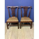 Pair Chippendale mahogany side chairs with drop in seats. Condition: General wear, top rail repair