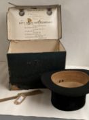 Black top hat, Brown Muff & Co Ltd Bradford, (small size) in case (very worn case) & hat brush