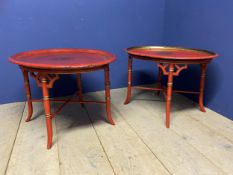 Pair of decorative red and gilt lacquered tables with oval tray top