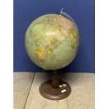 A globe on wooden stand