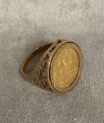 Half sovereign signet ring, in a 9ct gold open work mount, 7.8g, size R