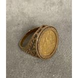 Half sovereign signet ring, in a 9ct gold open work mount, 7.8g, size R