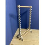 Decorative grey painted towel rail