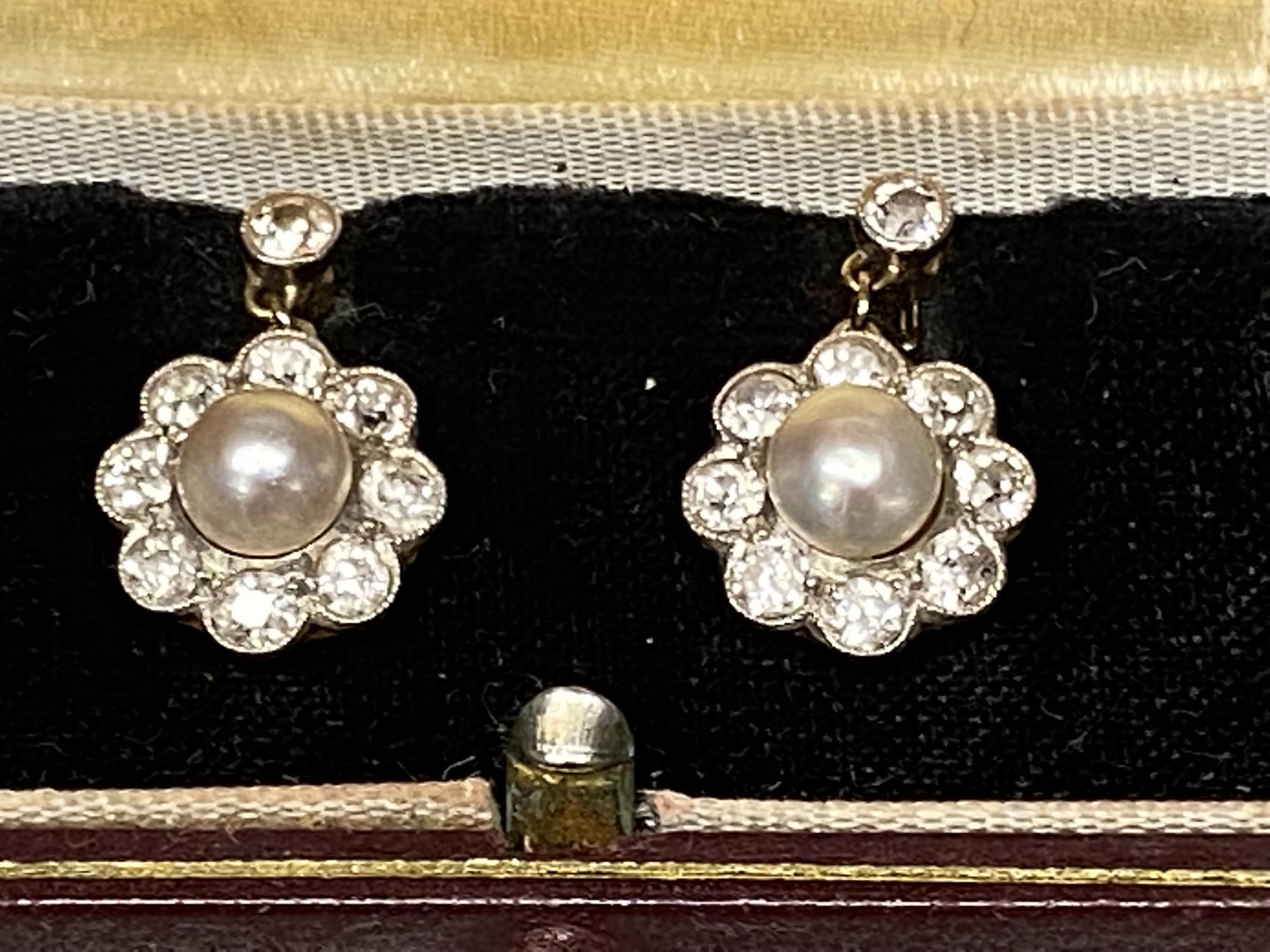 Pair of 18ct gold and platinum pearl and diamond drop earrings, central 4mm natural cultural pearl