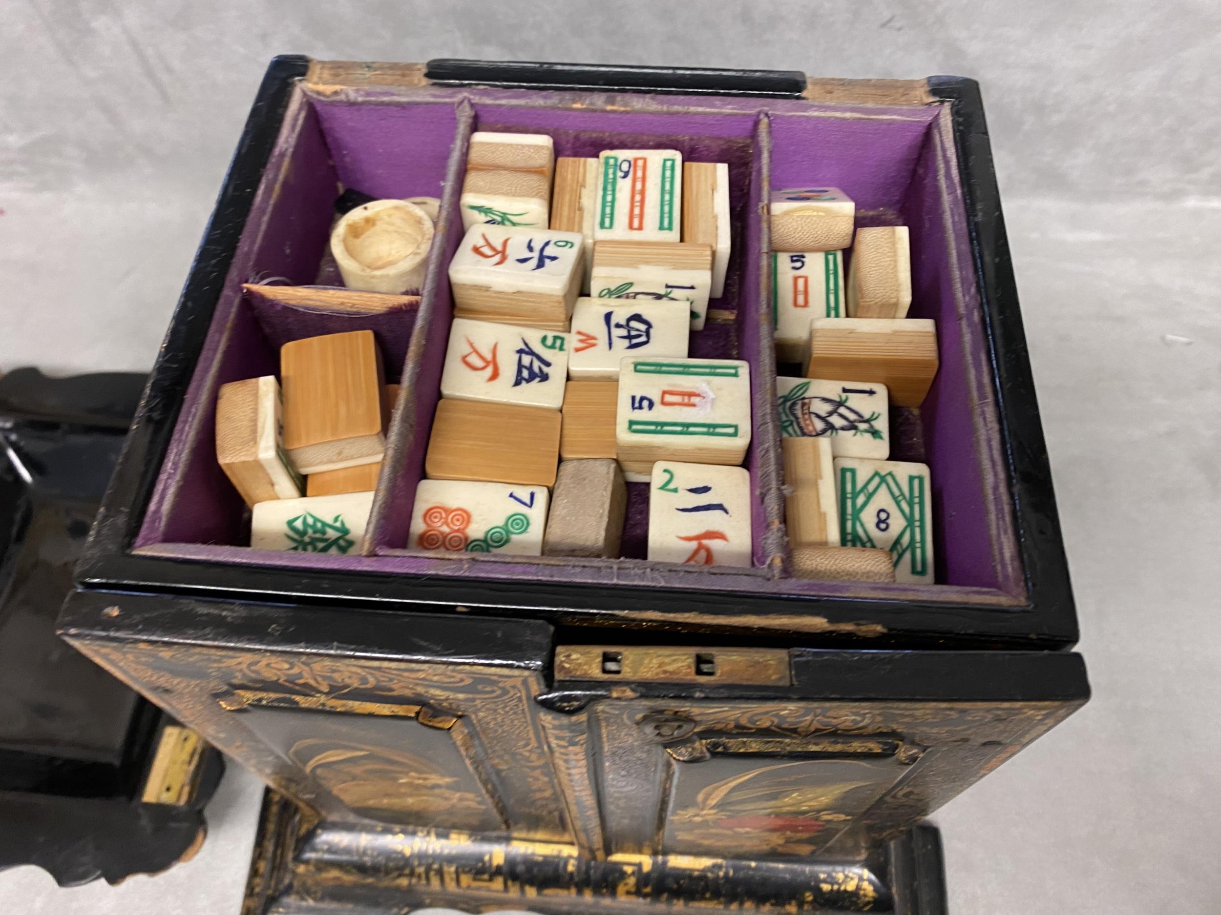 C19th/C20th wood & bone Mah Jong set in a black lacquered floral & gilt decorated 2 door papier - Image 2 of 10